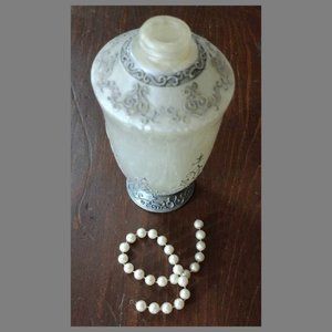 Decorative Plastic Lotion Bottle and small string of 26 Plastic Pearls